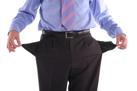 The gone bankrupt businessman stands with the turned out pocketsの写真素材