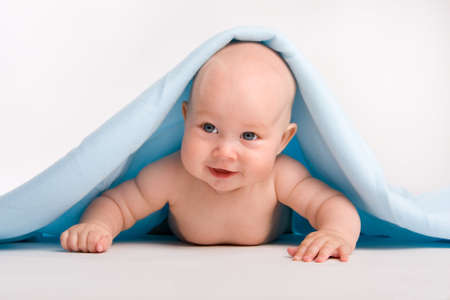 Happiness baby under a towelの写真素材