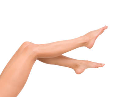 Beautiful female legs isolated on the white backgroundの写真素材