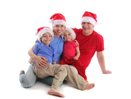 Happy family in Christmas hats 2の写真素材