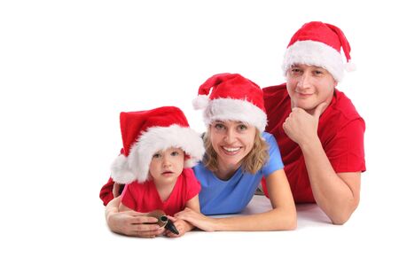 Happy family in Christmas hats 3の写真素材