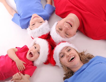 Happy family in Christmas hats 5の写真素材