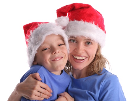 Happy mum with the son in Christmas capsの写真素材