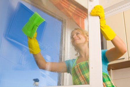 Women cleaning a window 4の写真素材
