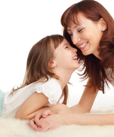 Mother with daughter isolated on whiteの写真素材