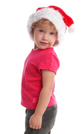 Little girl in santa hat isolated on whiteの写真素材