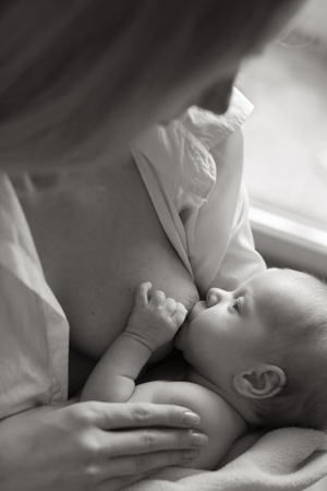 Mother breastfeeding the little babyの写真素材