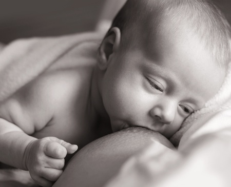 Mother breastfeeding the little babyの写真素材