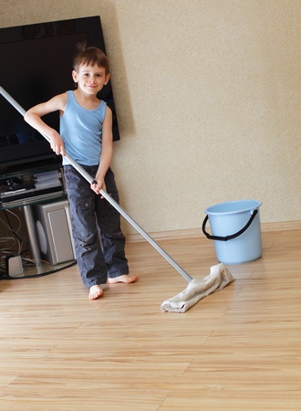 Little boy a washing floorの写真素材