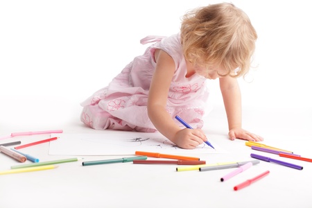 Little girl drawing the familyの写真素材