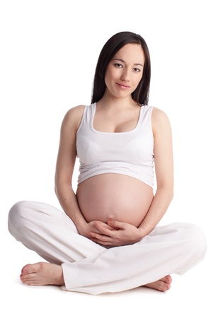 Beautiful pregnant woman isolated on white backgroundの写真素材