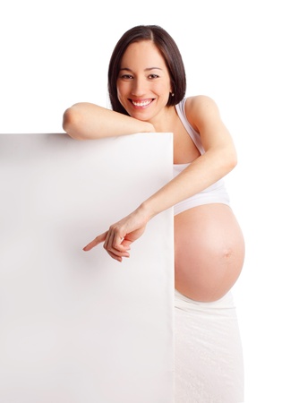 Pregnant woman with placard isolated on whiteの写真素材