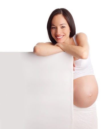Pregnant woman with placard isolated on whiteの写真素材