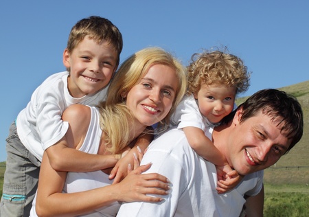 Happy family with two childrenの写真素材