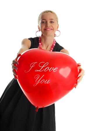 Beautiful woman in an elegant dress with balloonの写真素材