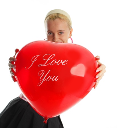 Beautiful woman in an elegant dress with balloonの写真素材