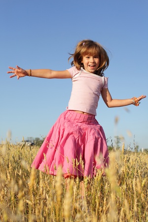 Portrait beautiful little girl outdoorsの写真素材