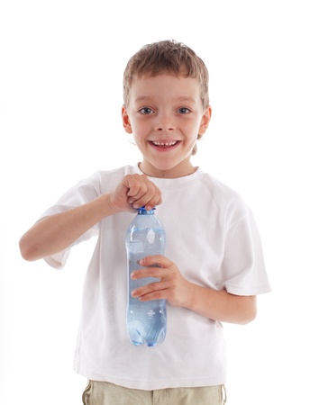 Ñhild with a water bottle isolated on whiteの写真素材