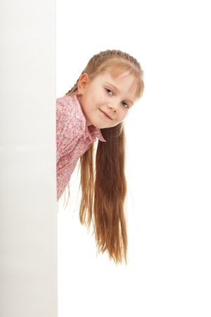 Little girl with blank isolated on whiteの写真素材