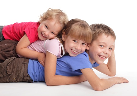 Happy children isolated on white の写真素材