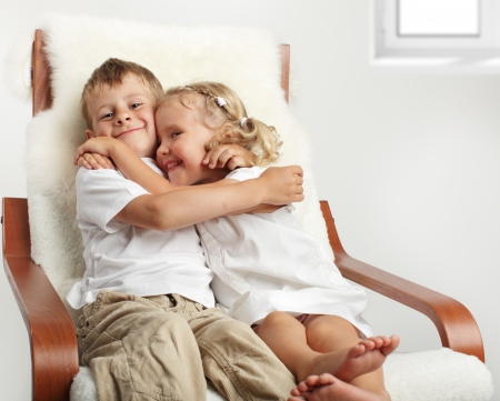 Brother with sister at homeの写真素材