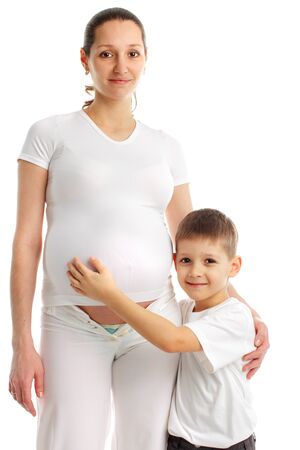 Pregnant woman with the son isolated on whiteの写真素材