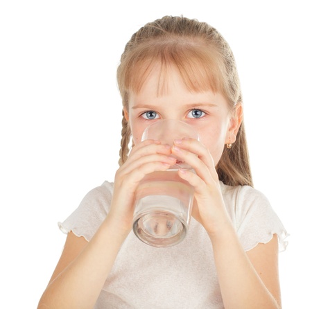 Girl with a glass of pure waterの写真素材