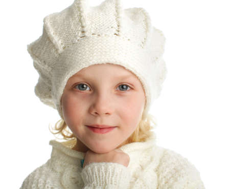 Portrait of a little girl in knitted hatの写真素材