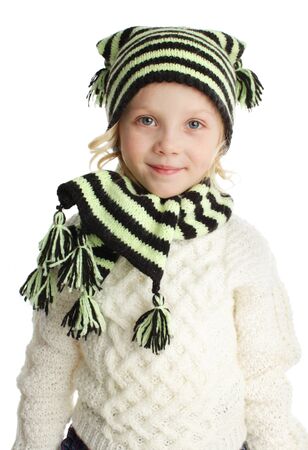 Portrait of a little girl in knitted hatの写真素材