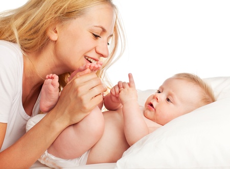 Mother with baby isolated on whiteの写真素材