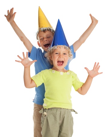 Happy children in a festive hatの写真素材