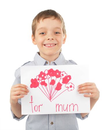 Child with drawing for mum isolated on whiteの写真素材