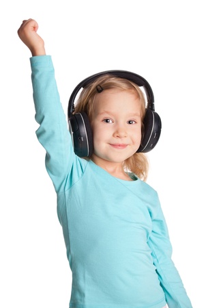 Little child in headphones isolated on whiteの写真素材
