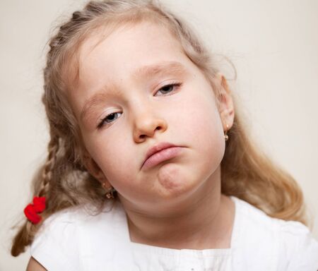 Sad child. Tired little girl