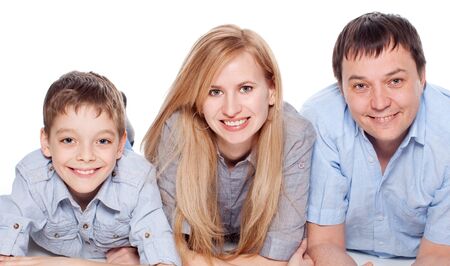 Happy family with child isolated on white background. Parents with son studio shotの写真素材
