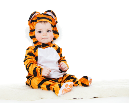 Baby dressed as a tiger. masqueradeの写真素材