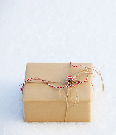 Gift on snow. Decoration on chrismasの写真素材