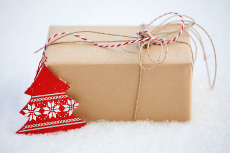 Gift on snow. Decoration on chrismasの写真素材