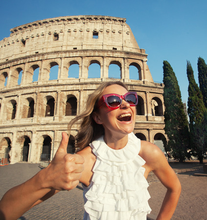 Rome, Italy. Woman on the background of the Colosseum. Happy touristの写真素材