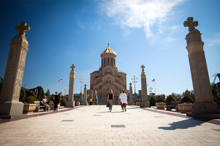 Cathedral of Tsmind Sameba, Tbilisi - MARCH 08: Tourists visiting the Cathedral of Tsmind Sameba in...