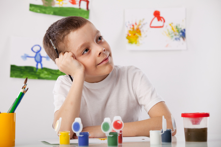 Child on a drawing classの写真素材