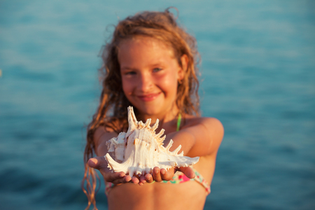 Girl on sea backgroundの写真素材