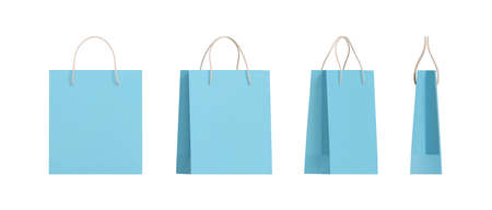 Set of 3d blue paper shopping bags packaging with different angles. Front and side view of retail purchase packaging, blank mockup. Realistic vector illustration isolatedのイラスト素材