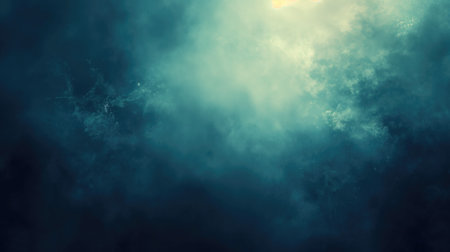 Ethereal blue smoke texture on a dark backgroundの素材