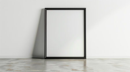 Blank picture frame against white wall on the floorの素材
