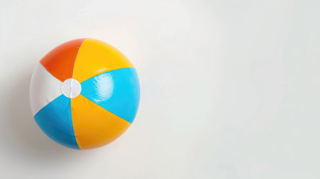 Colorful inflatable beach ball with white backgroundの素材
