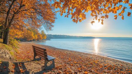 Tranquil autumn lakeside with empty bench, vibrant foliage, and clear skyの素材