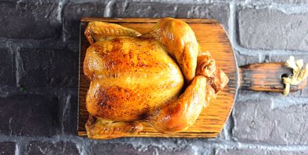 Fried chicken whole background brick. copy Spaceの写真素材