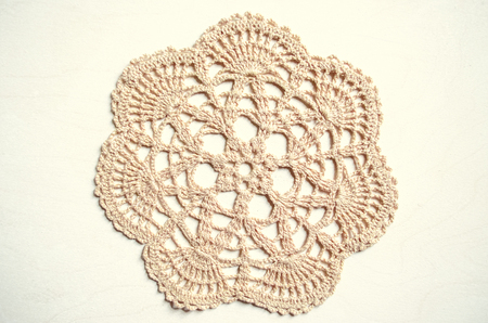 Napkin cream colored, related crochet of coarse  cotton yarnの写真素材