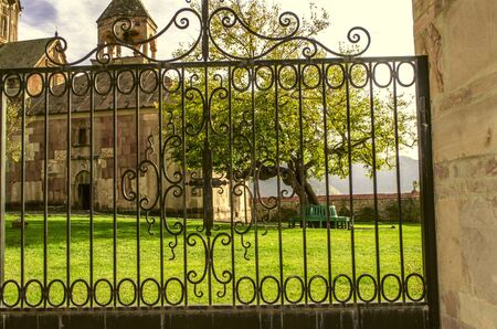 Entrance gate to the yard the monastery of St.John the Baptist in Gandzasarの写真素材